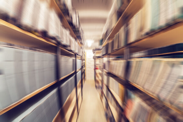 Shelves,Full,Of,Paper,Documents,Stored,In,An,Old,Archive.